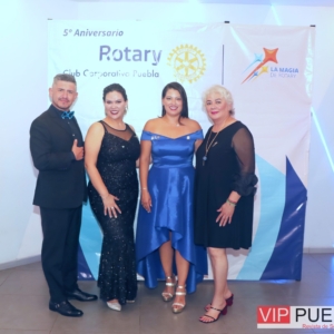 Haisselyne González y Miembros Rotarios